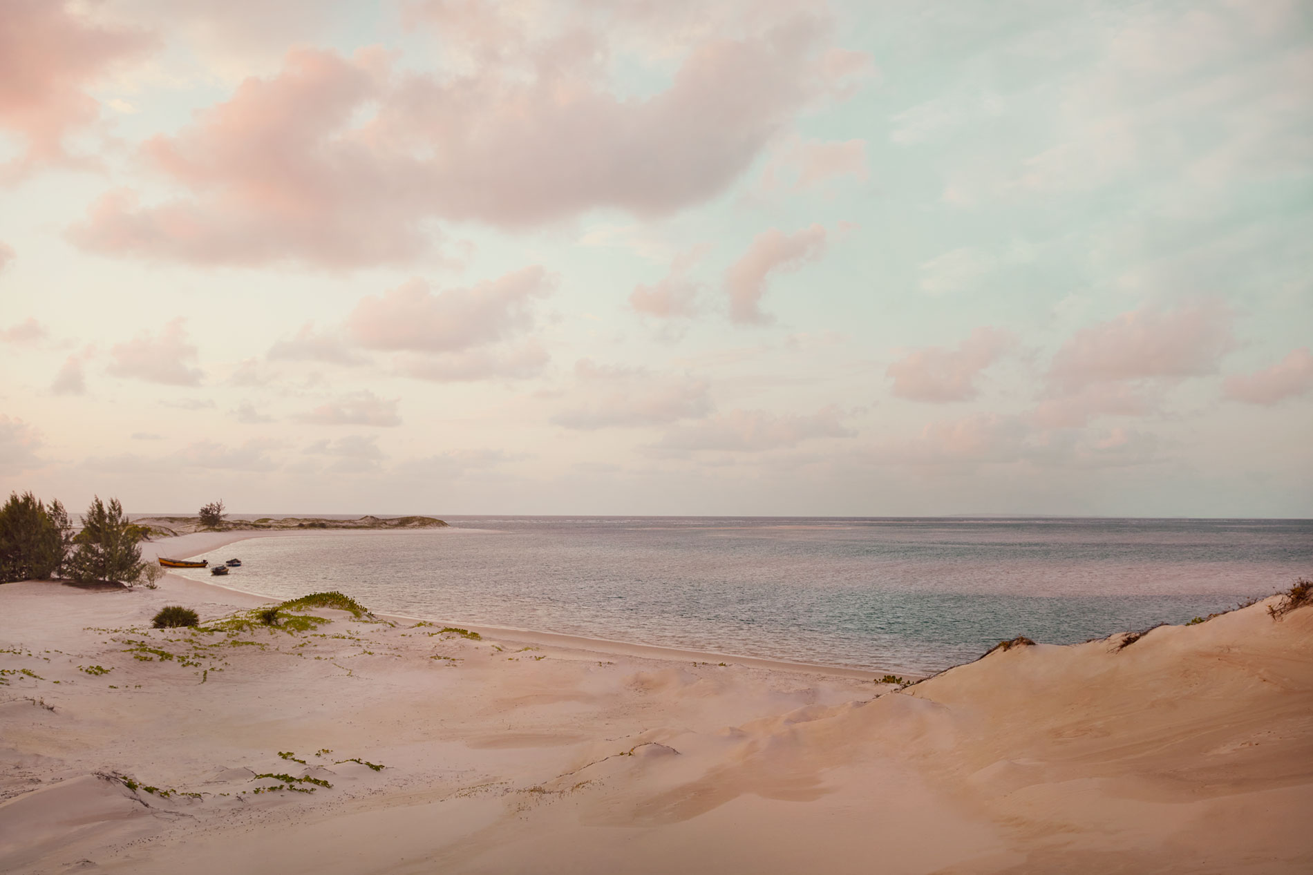 sand dunes and sea at sunrise