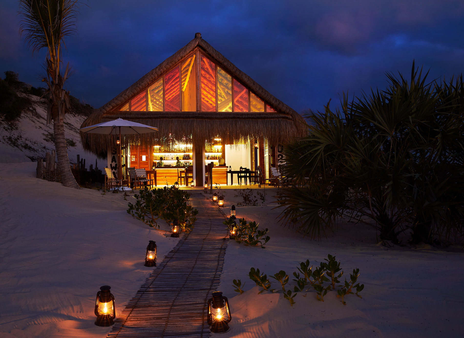 A residence lit up at night time
