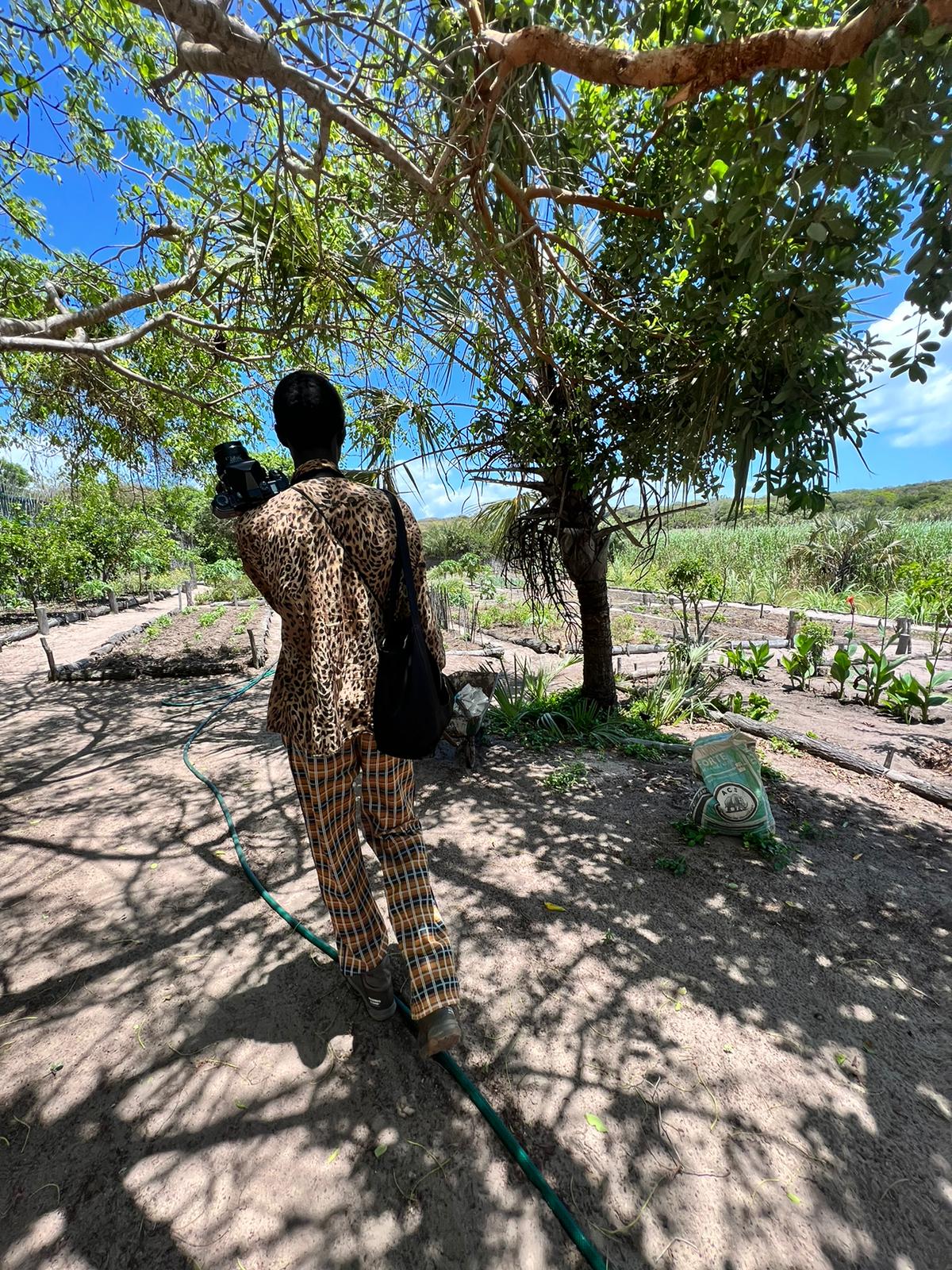 Malick Bodian visiting the permaculture garden at Kisawa