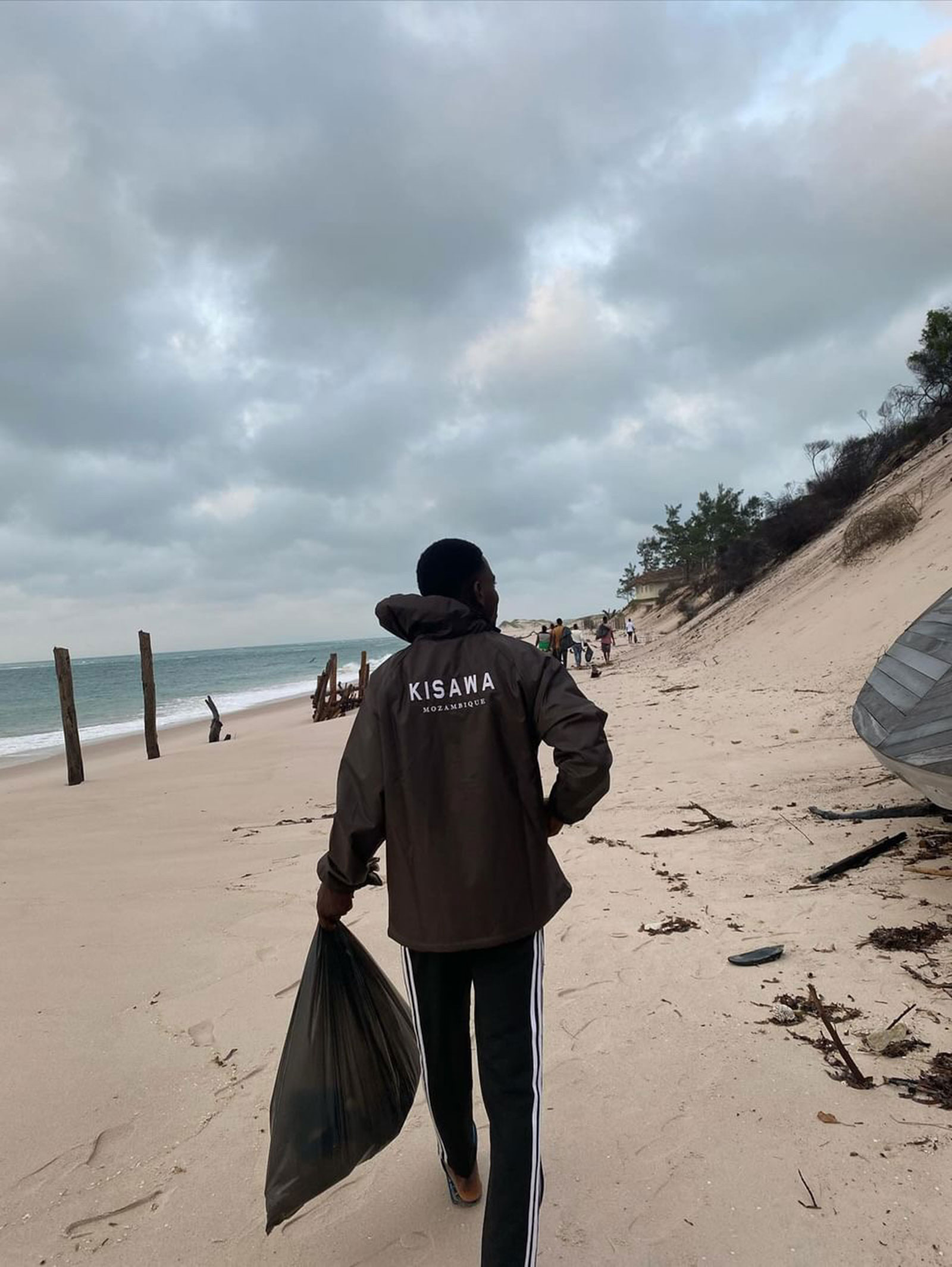 Kisawa team member at Benguerra Island beach