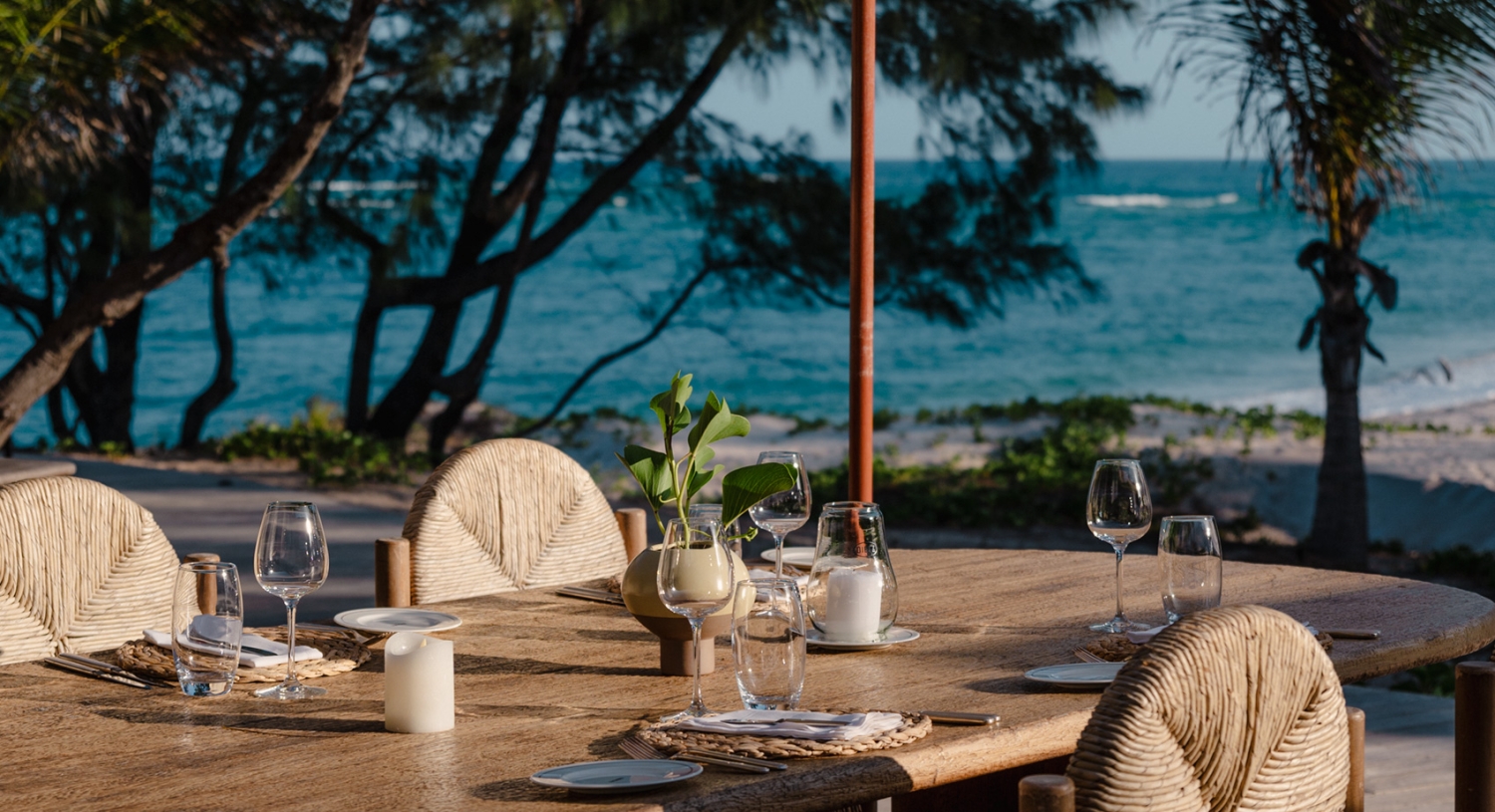 luxury boutique resort kisawa sanctuary in benguerra island, mozambique. Ourdoors dining at the main terrace with views of the ocean